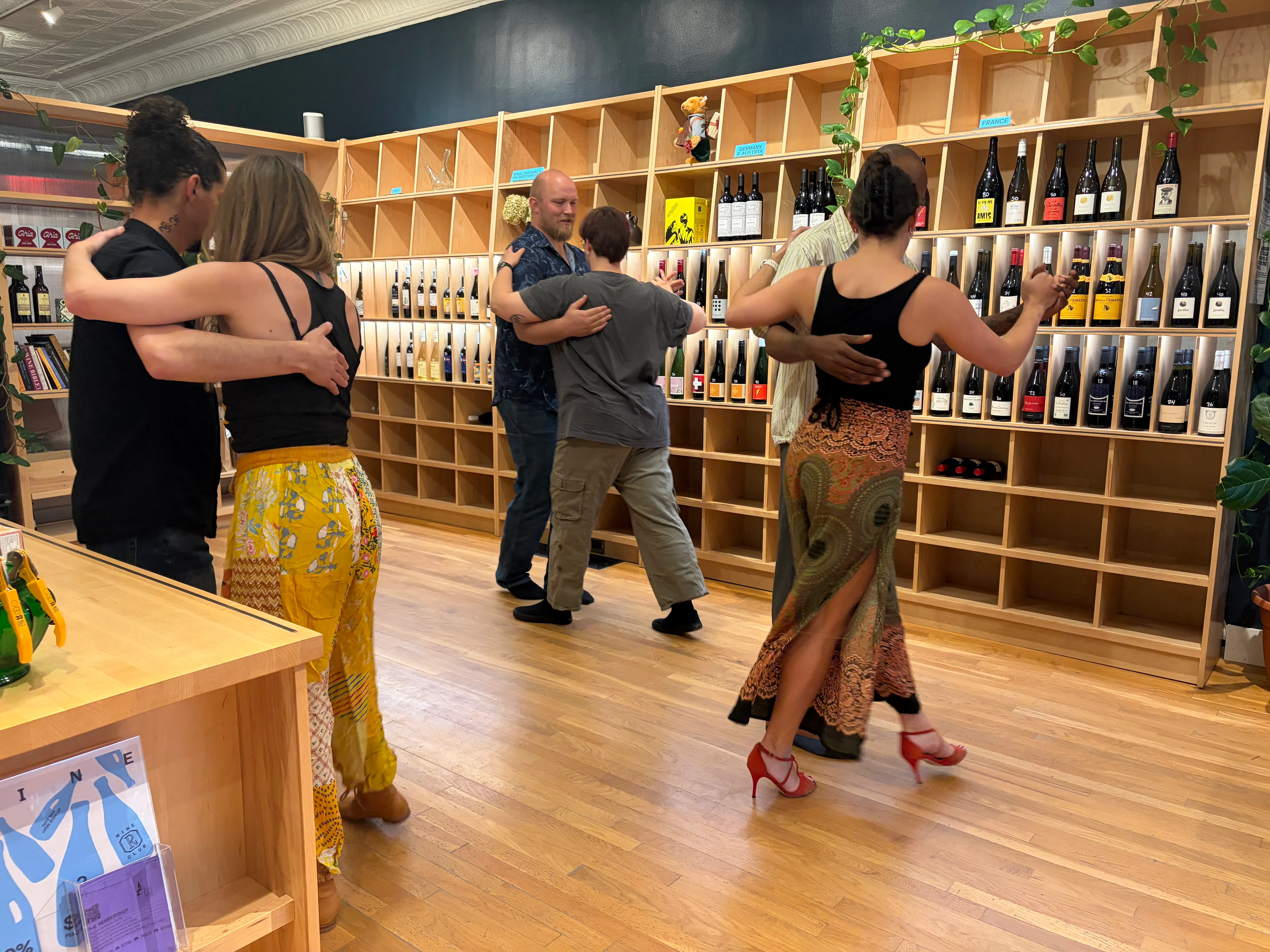 Three couples dancing tango at Ritual Wines